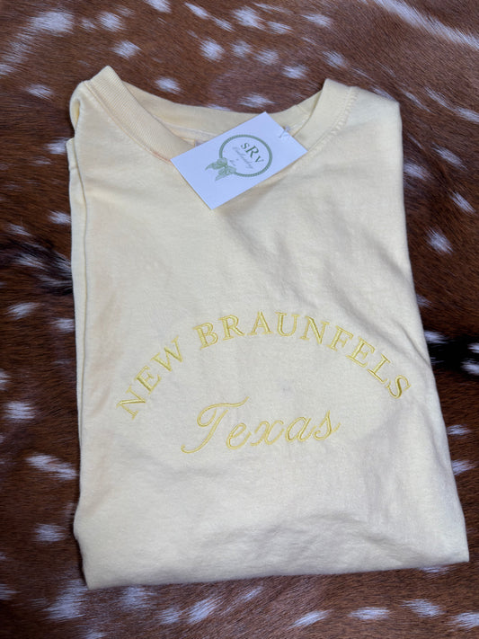 Comfort colors yellow  tshirt with “New Braunfels Texas” in yellow thread (unisex)